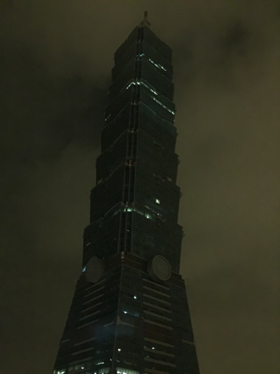 Taipei 101 at night in light fog